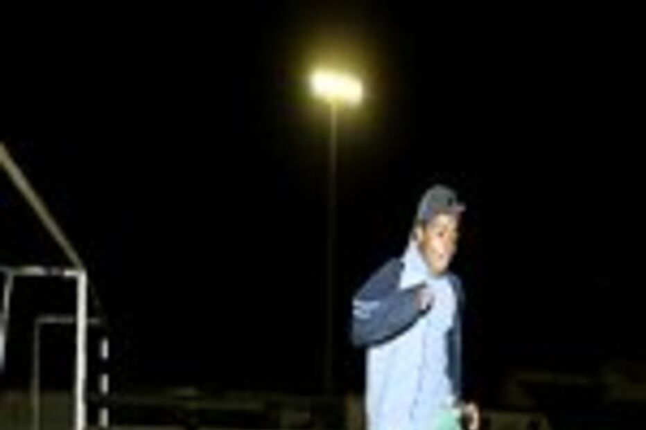 Piso de alcatrão em vez de sintético