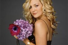 Líder dos Muse com Kate Hudson