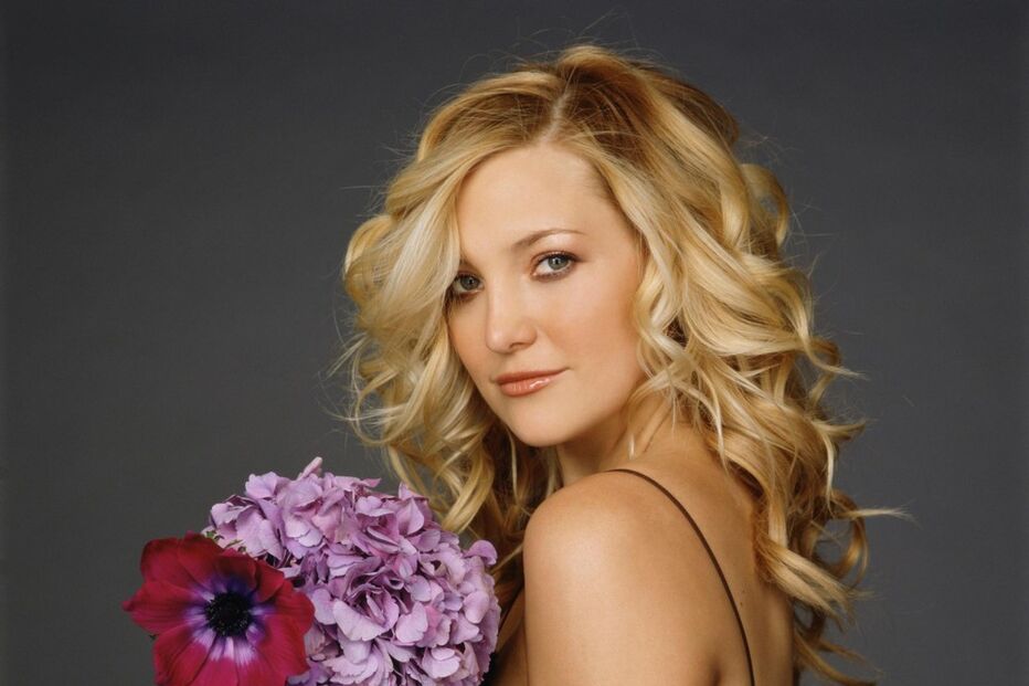 Líder dos Muse com Kate Hudson