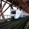 <![CDATA[ "Comboio da ponte" revolucionou mobilidade entre margens do Tejo ]]>