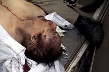 Horror e festejos na morte sangrenta de Kadhafi