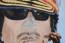 Horror e festejos na morte sangrenta de Kadhafi