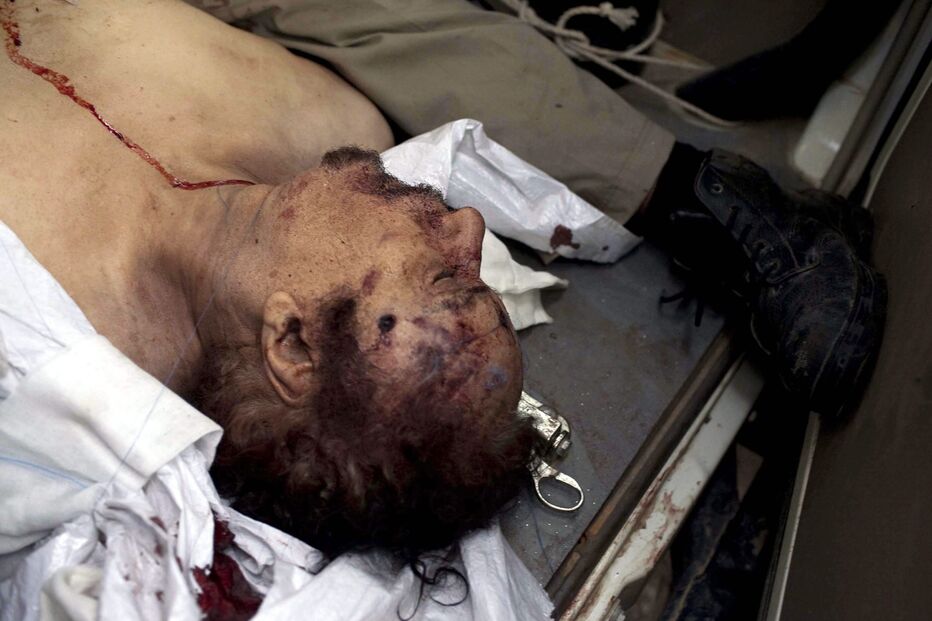 Horror e festejos na morte sangrenta de Kadhafi