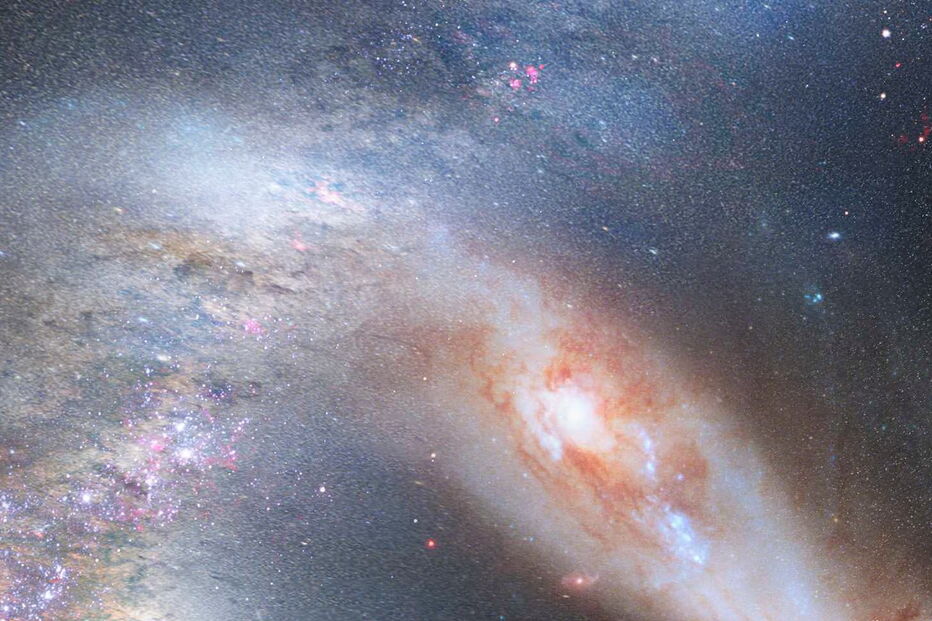 Uma imagem criada em computador pela NASA mostra como será o céu minutos antes da fusão entre a Via Láctea e a galáxia vizinha Andrómeda. As duas colidirão daqui a quatro mil milhões de anos e formarão uma única galáxia.
