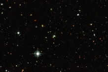 Chamam-se galáxias ‘feijão-verde’ devido à forma e são as maiores e mais brilhantes observadas até hoje. Estão na constelação Aquário (Ckht/Epa)