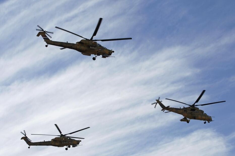 06-01-2015_21_39_09 5 - Iraqi Air Force helicopters fly past during the Iraqi Army Day's anniversary celebration in Baghdad.JPG