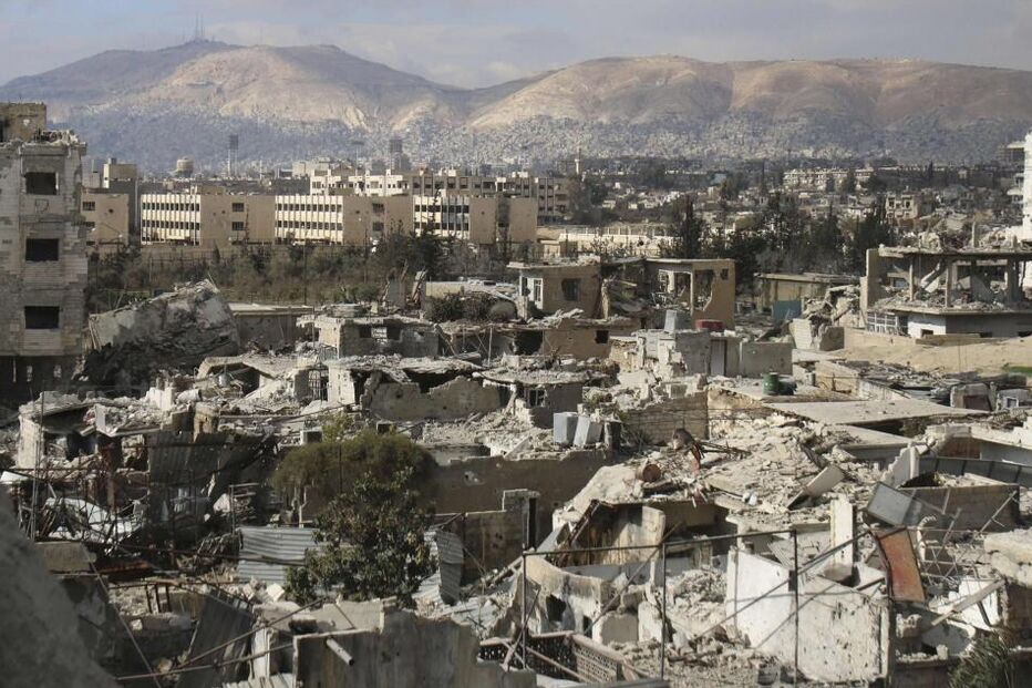 06-01-2015_21_40_48 1 - A general view shows damaged buildings in Jobar, a suburb of Damascus.JPG