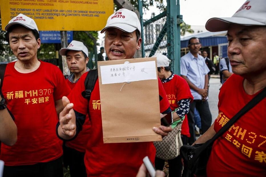 Protesto, voo, MH370