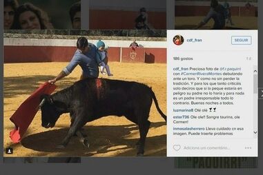 Toureiro enfrenta touro com bebé ao colo