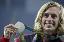 Jogos Olímpicos, Estados Unidos, imposto, Michael Phelps, Simon Biles, desporto, eventos desportivos