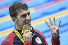 Jogos Olímpicos, Estados Unidos, imposto, Michael Phelps, Simon Biles, desporto, eventos desportivos