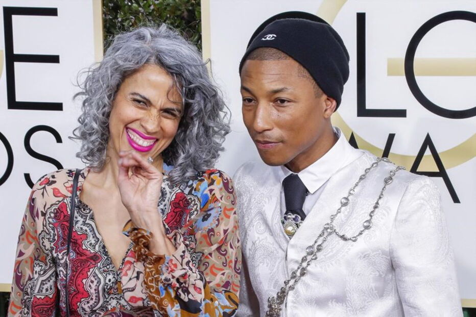 09-01-2017_09_23_38 Pharrell Williams (R) and Mimi Valdes.jpg