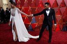 A modelo Chrissy Teigen com o marido, o cantor John Legend