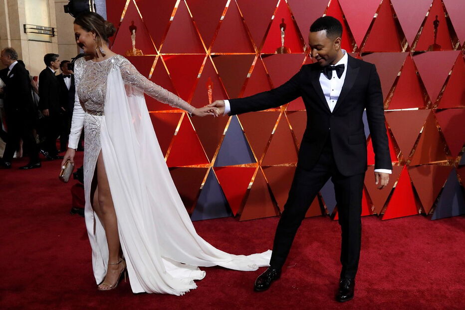 A modelo Chrissy Teigen com o marido, o cantor John Legend