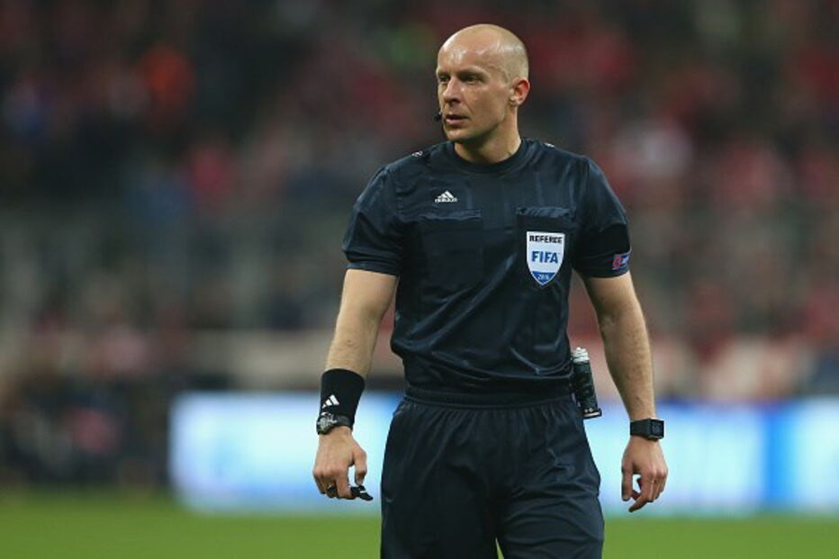 Árbitro Szymon Marciniak 