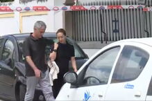 Treinador chegou cabisbaixo acompanhado pela mulher, Matilde
