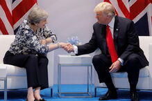 Donald Trump e Theresa May na cimeira do G20