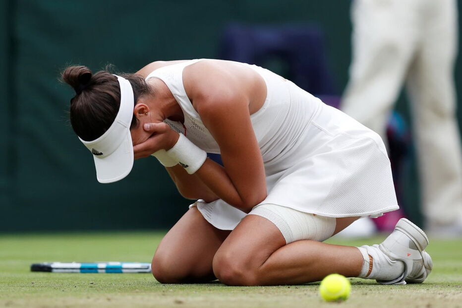Muguruza comemora vitória em Wimbledon