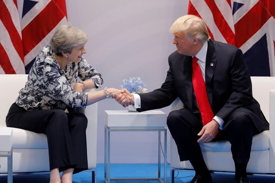 Donald Trump e Theresa May na cimeira do G20