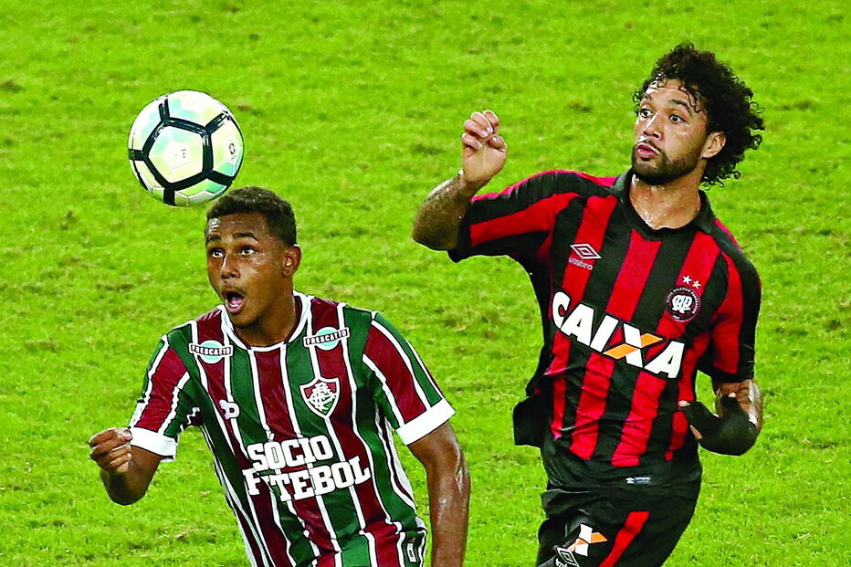 Wendel (esq.) é um médio de 19 anos que tem sido uma das revelações do Brasileirão. Foi formado e joga no Fluminense 