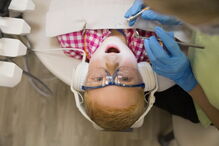 Criança no dentista