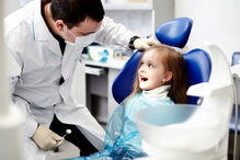 Criança no dentista