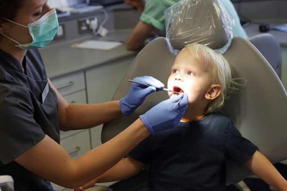 Criança no dentista