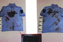  Roupa de Carlos Caetano estava ensanguentada. O corpo do militar foi colocado na mala do carro.