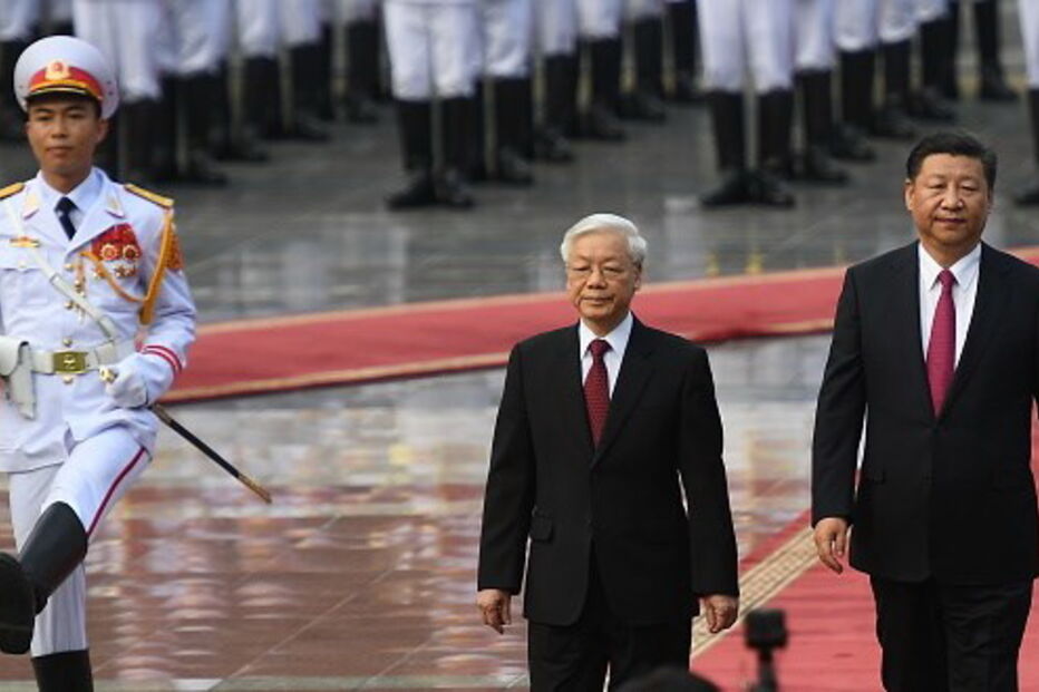 Presidente chinês, Xi Jinping, e o chefe do partido comunista do Vietname, Nguyen Phu Trong.