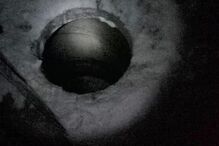 Burat caiu num buraco de esgoto
