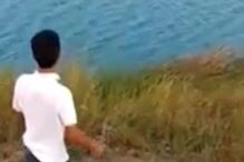 Cão bebé é devorado por crocodilo após homem o atirar a lago