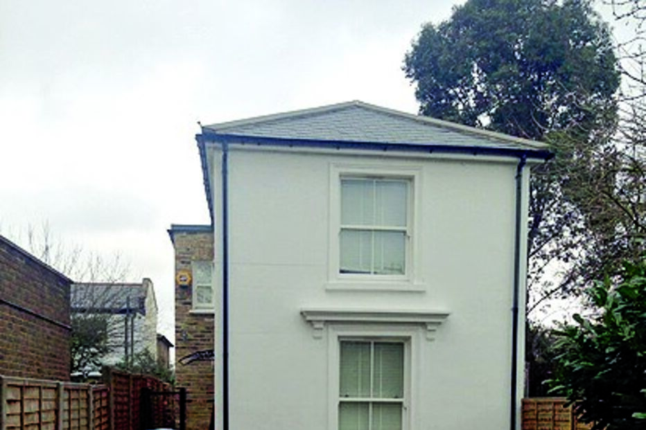 Casa onde residia a família portuguesa, no bairro londrino de Twickenham, ainda tem as fitas da polícia