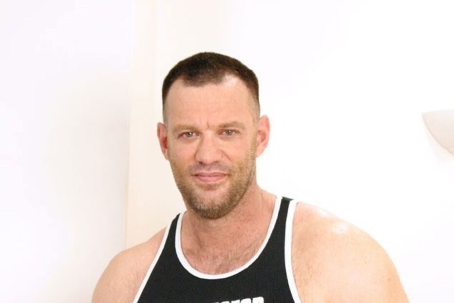 Scott Sherwood juntava a carreira de professor de matemática com a de ator porno. Nos filmes é Aaron Cage