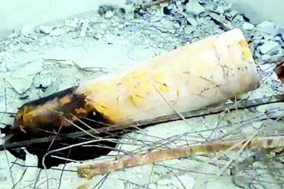 Outra garrafa no telhado de um edifício