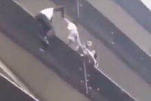 Homem salva menino de cair de quarto andar em França