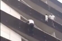 Homem salva menino de cair de quarto andar em França
