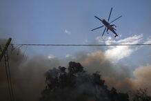 Incêndios descontrolados matam na Grécia