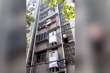 Homem escala prédio para salvar menino pendurado em varanda