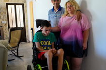 Conceição Lourenço e Carlos Filipe com o filho, David, de 12 anos 