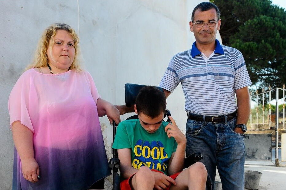 Conceição Lourenço e Carlos Filipe com o filho, David, de 12 anos 