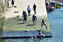 Casal e cão resgatados do Douro por populares no Porto