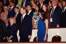  Meghan Markle em cerimónia com Harry