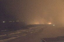 Fogo da serra de Sintra visto da praia do Guincho