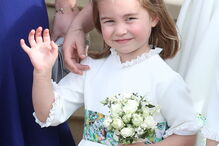 Príncipes Jorge e Carlota derretem corações em casamento real