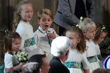 Príncipes Jorge e Carlota derretem corações em casamento real