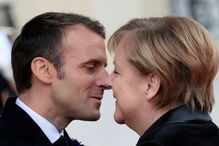 Emmanuel Macron e Angela Merkel