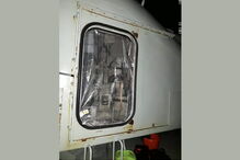 Danos na porta de acesso à torre da peça de 100 mm da fragata Corte Real