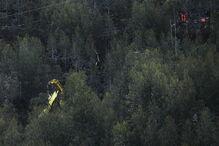 Destroços do helicóptero do INEM