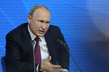 Vladimir Putin durante a conferência de imprensa anual em Moscovo, na Rússia