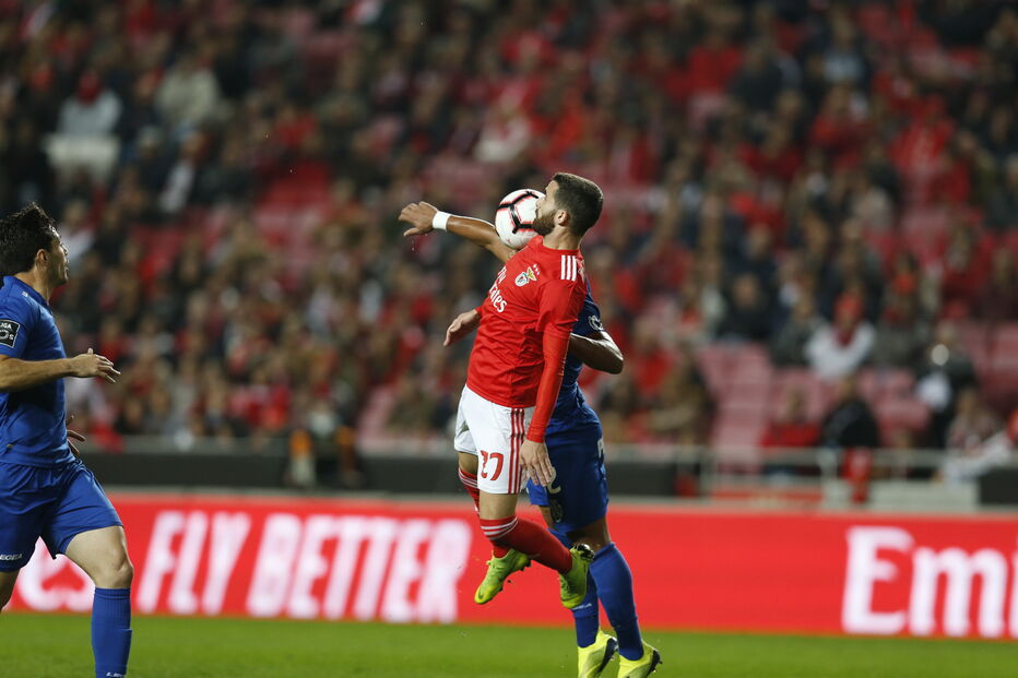 Jogadores em ação no Benfica - Feirense